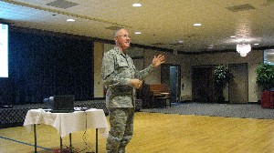 Col. Steven Hennessy, USAF, deputy director of communications and information, Air Education and Training Command, addresses attendees at the January luncheon.